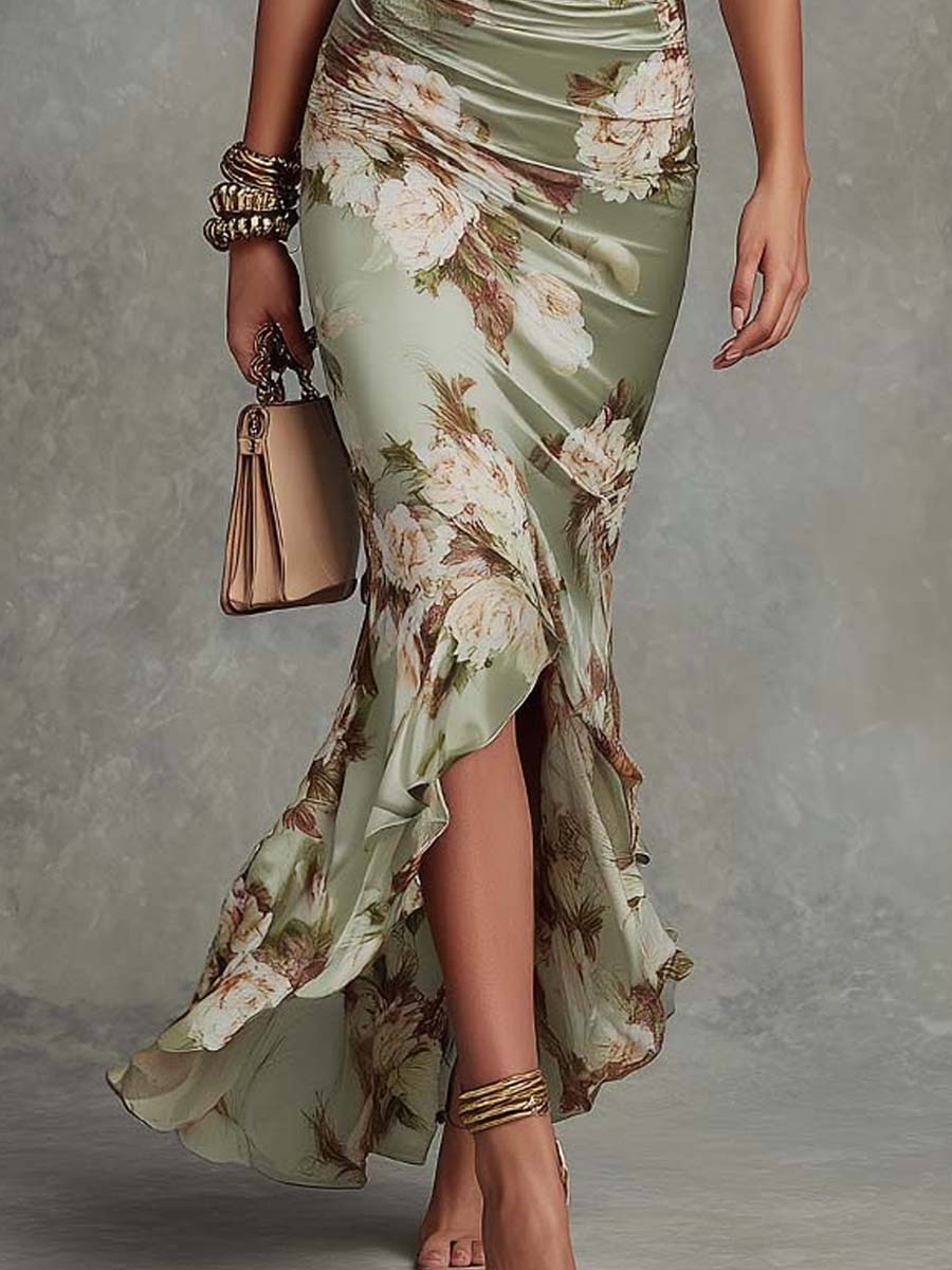 Vestido largo asimétrico de satén verde con estampado floral, mangas acampanadas fruncidas y escote en V